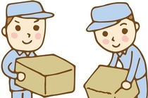 トラックから荷物を倉庫に下ろす作業